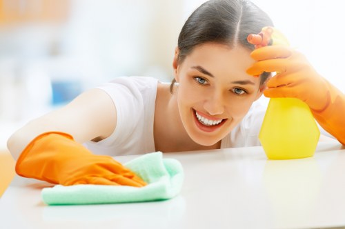 Professional sofa cleaning of a fabric couch in a living room